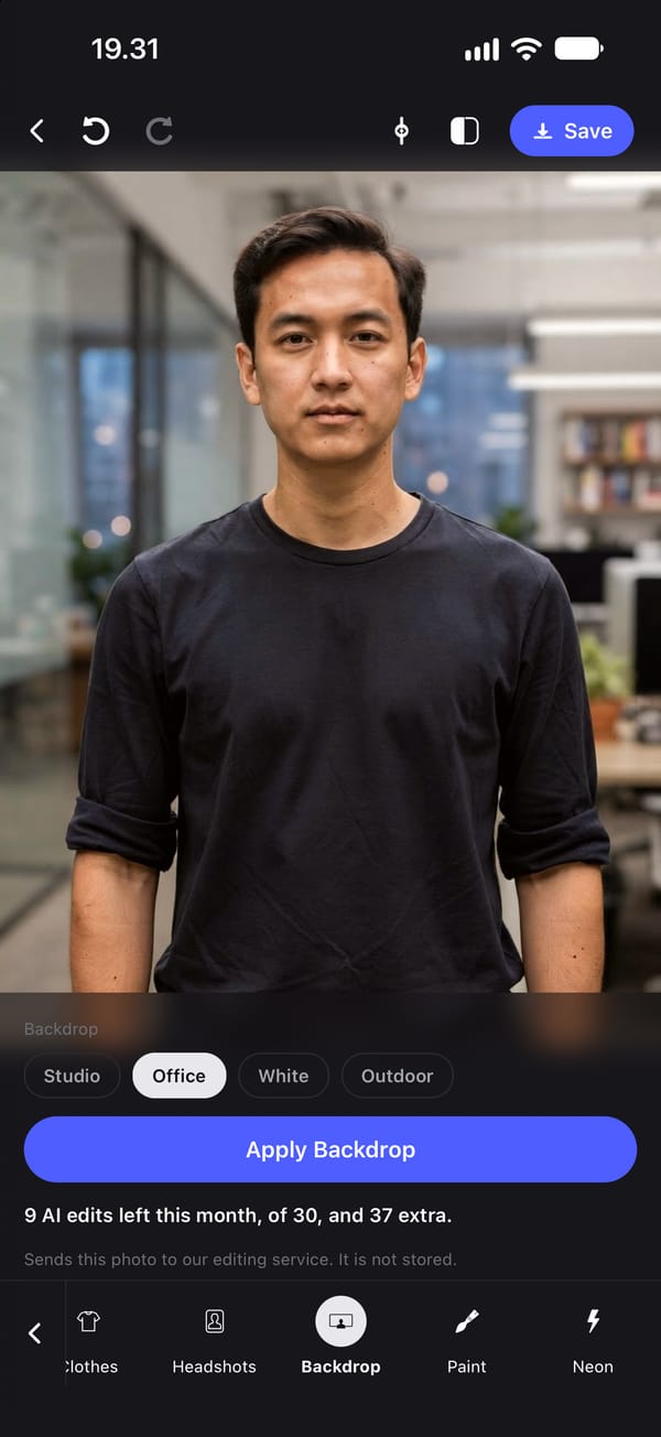 The same man after Apply Backdrop with Office: the park behind him is replaced by a softly blurred office, and he is as he was in the original.